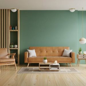 Living room with leather sofa and leather armchair on empty dark green wall background.3d rendering