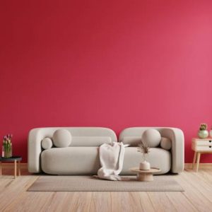 Viva magenta wall background mockup with sofa furniture and decor.3d rendering
